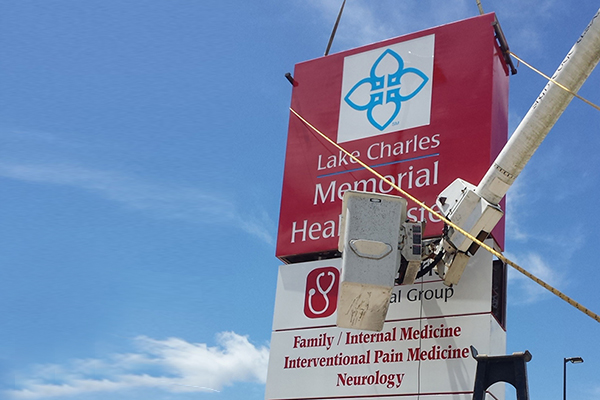 installation of Lake Charles Memorial signage